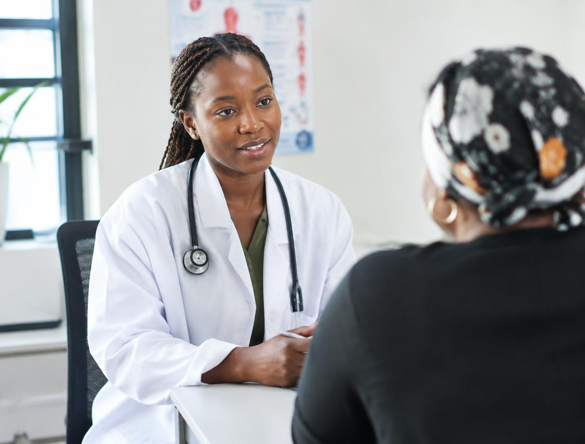 A Stratum network GP consulting with a member